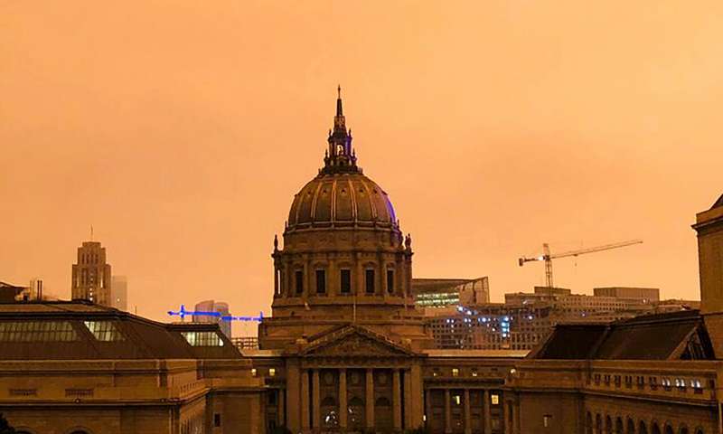 San Francisco City Hall is shrouded in smoke from multiple wildfires burning in the Sierra Nevada and Coast Ranges of Northern California, Wednesday morning, Sept. 9, 2020. Air quality throughout the West was heavily impacted. (AP Photo/Olga Rodriguez) Massive smoke clouds, thick air darken Western US skies