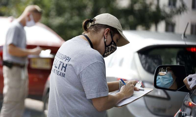 Months into crisis, Americans face frustrating test delays