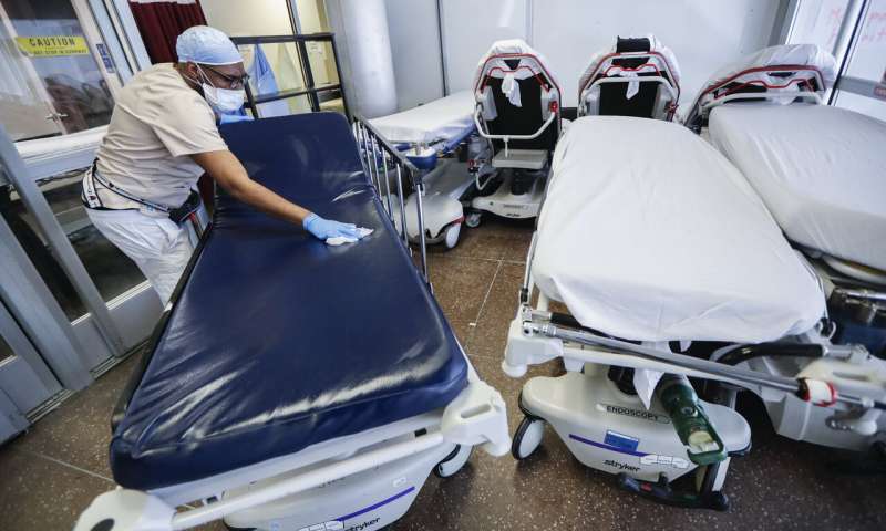 As virus rages in US, New York guards against another rise