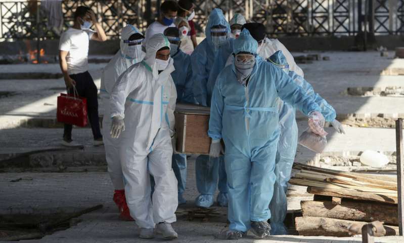 India tops 200,000 dead as virus surge breaks health system