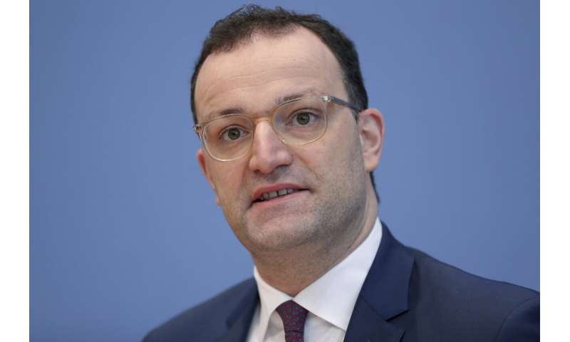 German Health Minister Jens Spahn addresses the media during a press conference in Berlin, Germany, Wednesday, Dec. 30, 2020 on the new coronavirus, COVID-19, situation and the vaccination campaign in Germany. German authorities have reported more than 1,000 coronavirus-related deaths in one day for the first time since the pandemic began. The national disease control center, the Robert Koch Institute, said Wednesday that 1,129 more deaths were reported over the past 24 hours. (AP Photo/Michael Sohn, pool) Germany set for longer lockdown as death figures spike