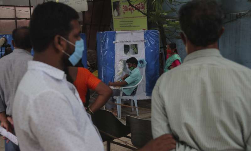 India's virus caseload tops 3 million as disease moves south