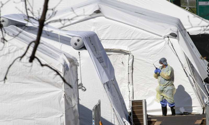 As virus rages in US, New York guards against another rise