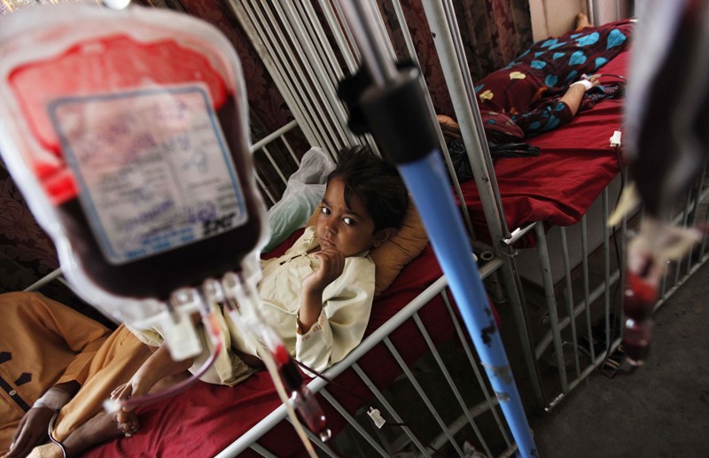 A young Pakistani suffering from the blood disorder Thalassemia receives a blood transfusion