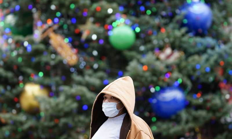 US virus deaths hit record levels with the holidays ahead