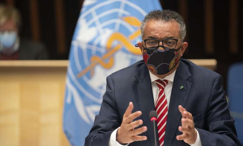 In this photo released by WHO, World Health Organisation on Monday, Oct. 5, 2020, WHO Director-General, Dr Tedros Adhanom Ghebreyesus, wearing a mask to protect against coronavirus, gestures during a special session on the COVID-19 respnse. The head of emergencies at the World Health Organization says its "best estimates" indicate that roughly 1 in 10 people worldwide may have been infected by the coronavirus. (Christopher Black/WHO via AP) WHO: 10% of world's people may have been infected with virus