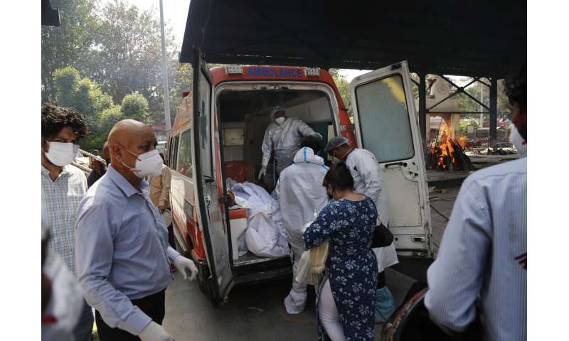 India tops 200,000 dead as virus surge breaks health system