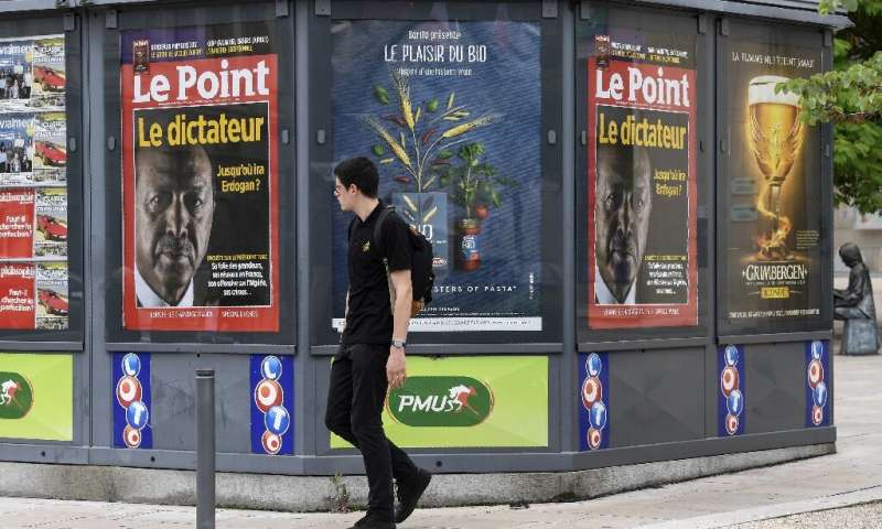 A 2018 picture shows a newsstand in France, where authorities have ordered Google to negotiate payments to media to comply with