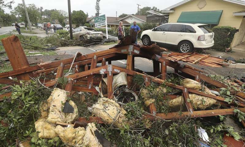 Debris is strewn on the ground Sunday, June 7, 2020, at Lake Margaret Village Apartments following a tornado that struck late Saturday, in Orlando, Fla. (Stephen M. Dowell/Orlando Sentinel via AP) Rain, road flooding as Tropical Storm Cristobal draws closer