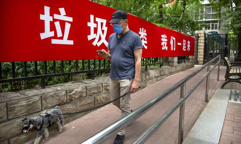 China tames new outbreak but elsewhere virus cases surge