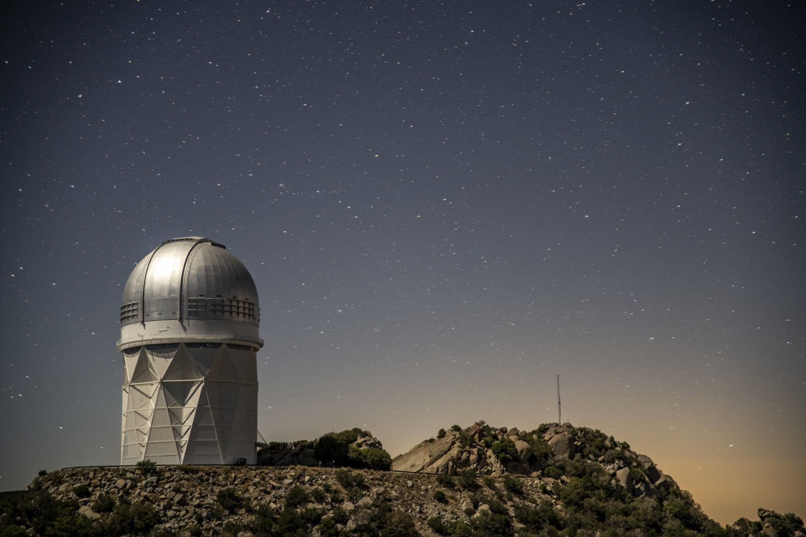 Photo - DESI is installed within the dome of the Mayall Telescope at Kitt Peak National Observatory near Tucson, Arizona. (Credit: Marilyn Sargent/Berkeley Lab)