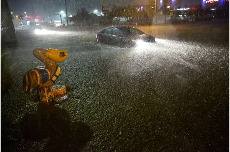 Motorists navigate a flooded Gause Boulevard in Slidell, La., late Friday, June 18, 2021, as a tropical disturbance neared the Louisiana shore. Tropical Storm Claudette has formed Saturday morning along the U.S. Gulf Coast, bringing heavy rains and flooding to coastal states including Louisiana, Mississippi and Alabama. Credit: Scott Threlkeld/The Advocate via AP Major damage to Alabama mobile home park amid tropical storm