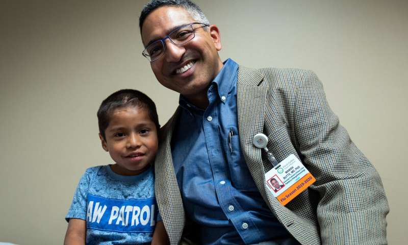 Dr. Manish Butte with Abraham Gonzalez-Martinez, who at age 4 was treated for a case of disseminated coccidioidomycosis. Credit: Nick Carranza / UCLA Health Reprogramming of immune system cures child with often-fatal fungal infection