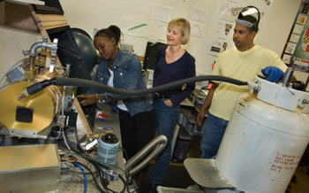 Image - Natalie Roe works with students participating in internships offered by the Lab's Center for Science and Engineering Education in this 2006 photo. (Credit: Roy Kaltschmidt/Berkeley Lab)