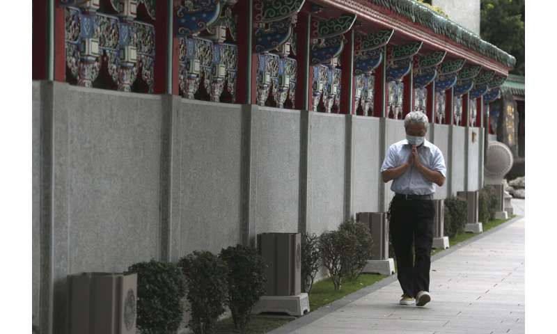 Restrictions reimposed as virus resurges in much of Asia