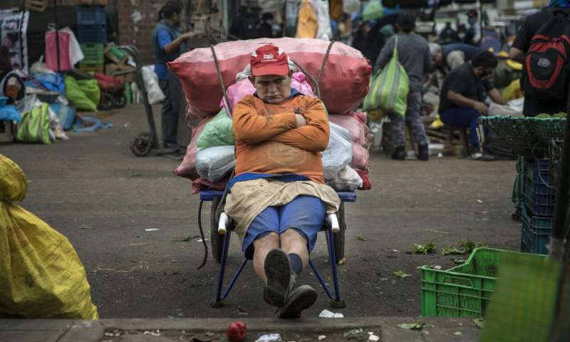China tames new outbreak but elsewhere virus cases surge
