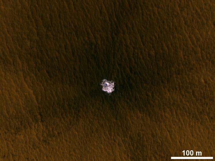 The image is an excerpt from an observation from NASA's Mars Reconnaissance Orbiter showing a meteorite impact that excavated this crater on Mars exposed bright ice that had been hidden just beneath the surface at this location. Credit: NASA/JPL-Caltech/Univ. of Arizona Where should future astronauts land on Mars? Follow the water