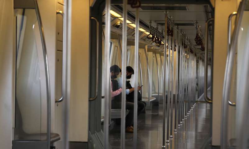 Commuters travel in an almost empty Delhi metro train in New Delhi, India, Monday, Sept. 7, 2020. India's coronavirus cases are now the second-highest in the world and only behind the United States, as the caseload crosses Brazil on a day when urban metro trains partially resume service in the capital New Delhi and other states. (AP Photo/Manish Swarup) India now 2nd worst-hit country by virus amid economic pain