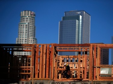 A construction worker on a building site in downtown Los Angeles, California, March 10, 2015, photo  by Lucy Nicholson/Reuters