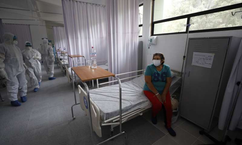 China tames new outbreak but elsewhere virus cases surge