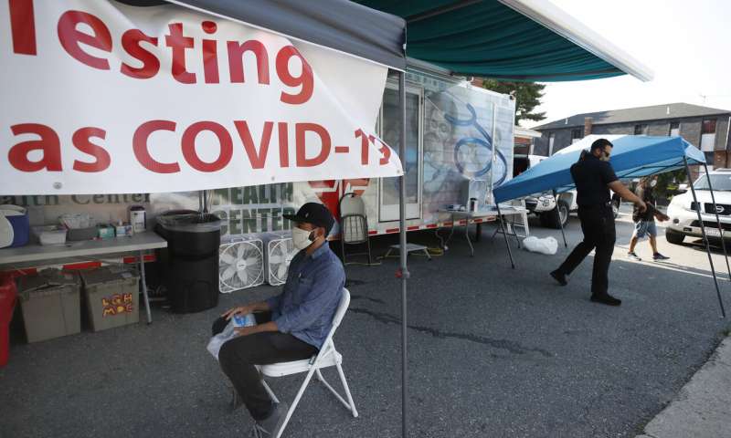 Months into crisis, Americans face frustrating test delays