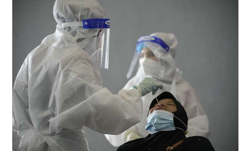 Malaysia buys more vaccine to accelerate virus inoculations