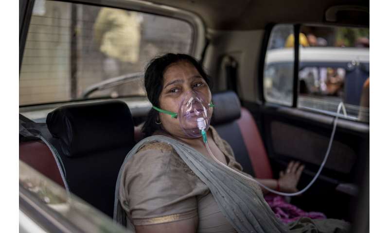 India tops 200,000 dead as virus surge breaks health system