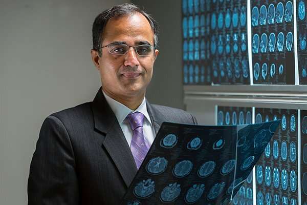 Nitin Tandon, MD, and his research team identified a crucial region in the temporal lobe which appears to act as the brain’s visual dictionary. Credit: James LaCombe Research unlocks new information about reading through visual dictionary in the brain