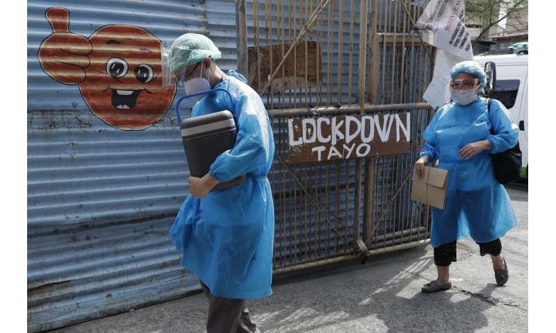 Restrictions reimposed as virus resurges in much of Asia