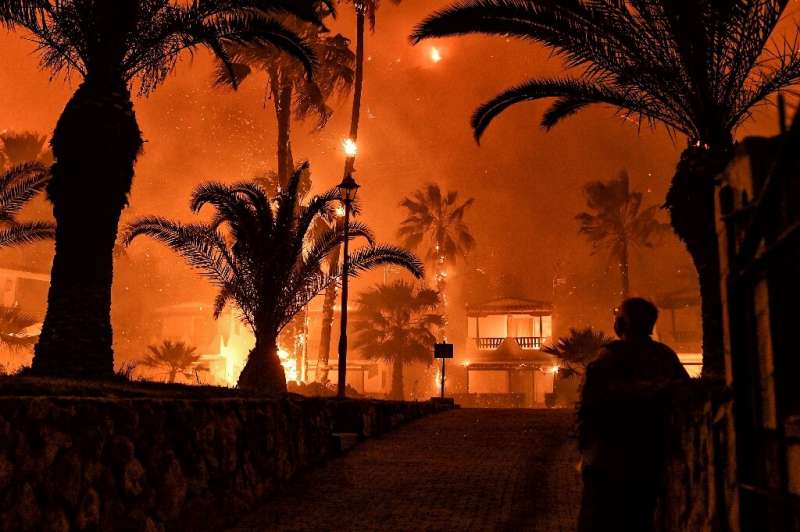 The blaze started late on Wednesday near the village of Schinos. The blaze started late on Wednesday near the village of Schinos