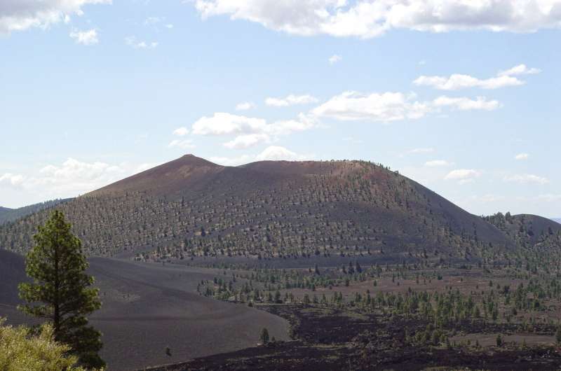 Around 1085 AD, along the southern rim of Northern Arizona's elevated Colorado Plateau, a volcano erupted, forever changing ancient Puebloan fortunes and all nearby life. Today, ASU School of Earth and Space Exploration scientist Amanda Clarke and her team have been working to solve the mysterious root cause of the Sunset Crater eruption and any lessons learned to better understand the threats similar volcanoes may pose around the world today. Credit: U.S. Geological Survey Understanding origins of Arizona's Sunset Crater eruption of 1,000 years ago