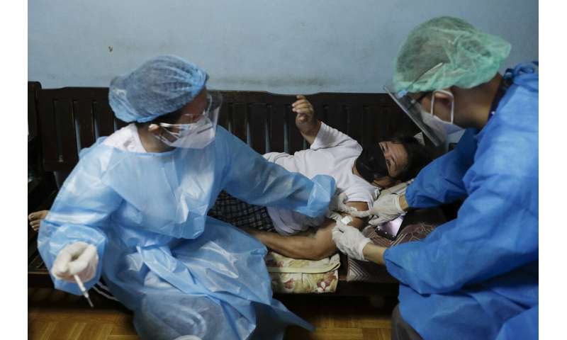 Restrictions reimposed as virus resurges in much of Asia