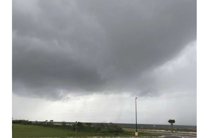 Clouds from Tropical Storm Claudette form on Highway 90 Beaches in Pass Christian, Miss., Friday, June 18, 2021. City of Pass Christian has declared state of emergency for potential severe weather. Credit: Hunter Dawkins/The Gazebo Gazette via AP Major damage to Alabama mobile home park amid tropical storm
