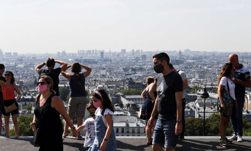 People must now wear masks at Paris spots like Montmartre, famous for its viewover the French capital's skyline