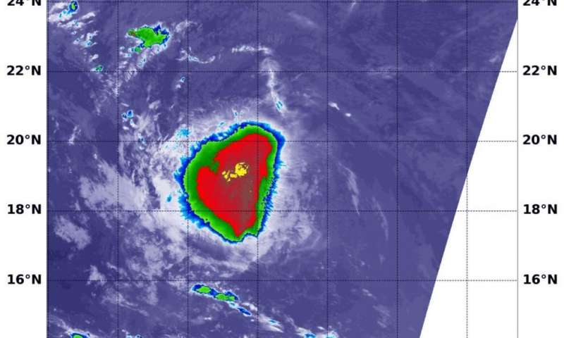 On Sept. 11 at 12:35 a.m. EDT (0435 UTC), the MODIS instrument that flies aboard NASA’s Aqua satellite revealed a small area of the most powerful thunderstorms (yellow) around Rene’s center where cloud top temperatures were as cold as minus 80 degrees Fahrenheit (minus 62.2 Celsius). A larger area of strong storms (red) with cloud top temperatures as cold as minus 70 degrees Fahrenheit (minus 56.6. degrees Celsius) surrounded the center and were generating large amounts of rain. Credit: NASA/NRL NASA satellite finds an elongated Tropical Storm Rene caused by wind shear
