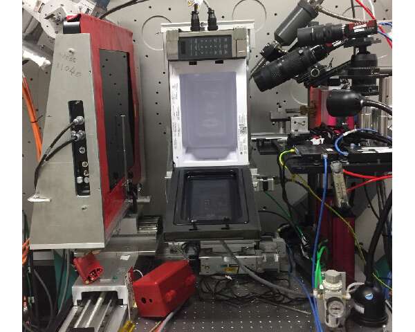 If you look carefully in the center of this photo, you will see the $30 microwave oven that Reeja Jayan reengineered to start her early experiments. Credit: Reeja Jayan Microwaving new materials