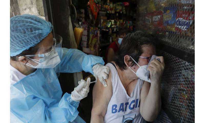 Restrictions reimposed as virus resurges in much of Asia