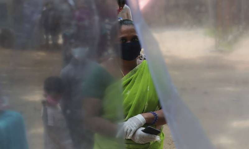 India's virus caseload tops 3 million as disease moves south