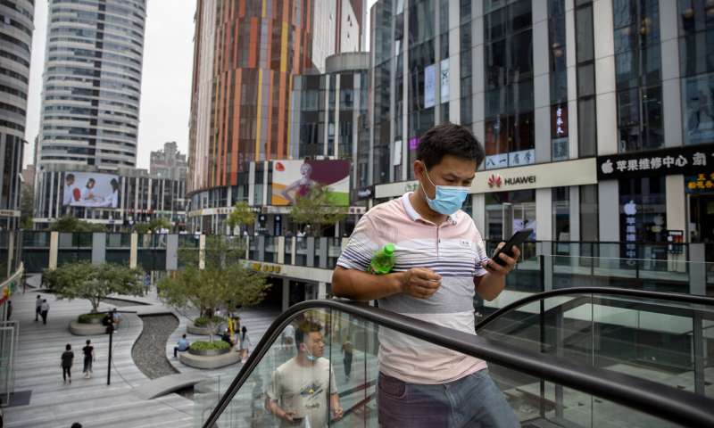 China tames new outbreak but elsewhere virus cases surge