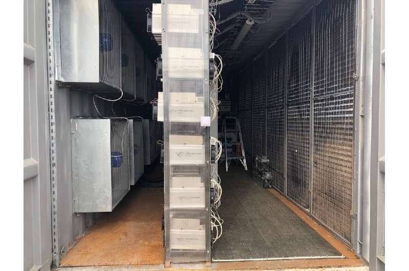 A handout photo from October 2020 shows computers dedicated to mining bitcoin in an EZ Blockchain data center