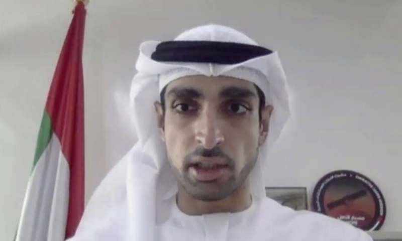 In this image made from video released by Mitsubishi Heavy Industries, project manager Omran Sharaf speaks during a pre-launch video briefing of a Mars orbiter, Monday, July 13, 2020. The United Arab Emirates is up first with the Martian orbiter set to launch from Japan on Wednesday, July 15. The liftoff of the Mars orbiter named Amal, or Hope, from Japan marked the start of a rush to fly to Earth's neighbor. (Mitsubishi Heavy Industries via AP) Bad weather may delay 1st UAE Mars mission on Japan rocket