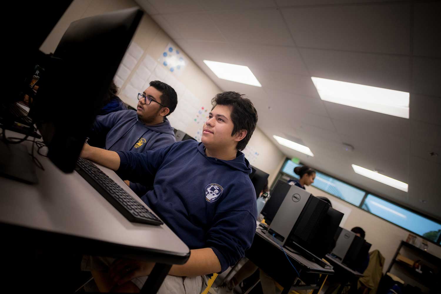 Students at computers in class.