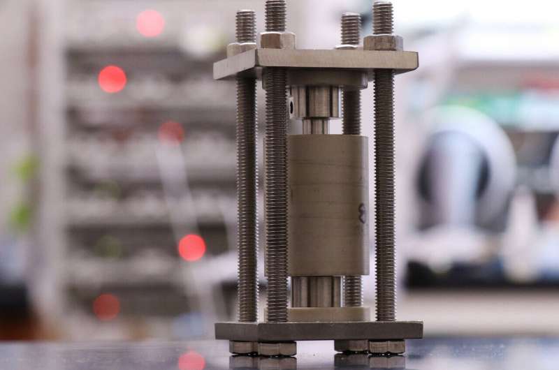 Solid-state batteries are charged and discharged in custom-made hardware designed at Georgia Tech. A smaller, modified version of the cell shown here was used to image these materials during cycling. Credit: Matthew McDowell, Georgia Tech X-Ray tomography lets researchers watch solid-state batteries charge, discharge
