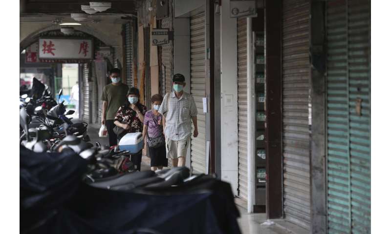 Restrictions reimposed as virus resurges in much of Asia