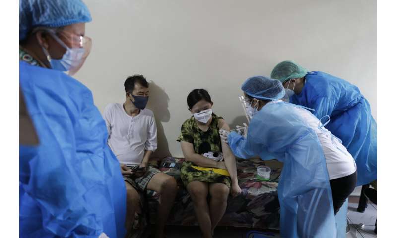Restrictions reimposed as virus resurges in much of Asia