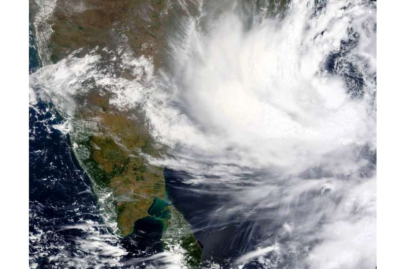 This Monday, May, 24, 2021, satellite image provided by NASA shows Cyclone Yaas approaching India's eastern coast. Yaas is expected to make landfall on Wednesday, May 26, 2021, and could pack sustained winds of up to 165 kilometers per hour (102 miles per hour), the India Meteorological Department said. It said the storm was forecast to hit the eastern states of West Bengal and Odisha, just days after a powerful storm battered the country's western coast and killed at least 140 people. (NASA Worldview, Earth Observing System Data and Information System (EOSDIS) via AP) Thousands evacuated in India as strong cyclone inches closer